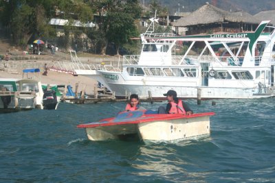 These two boys were riding in a catamaran as my boat was coming ashore.