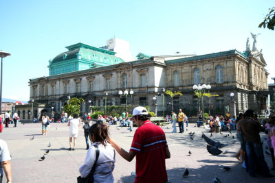 People walking in Culture Plaza (Plaza de la Cultura) in San Jos, Costa Rica next to the National Theater.