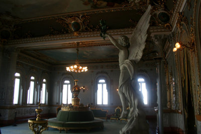 This is a very ornate lounge on the second floor where people converge between acts.