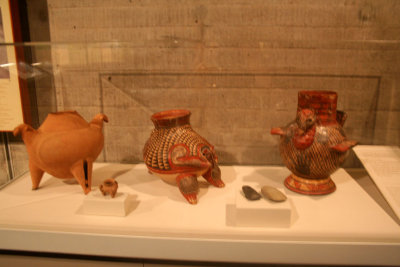 Pre-Columbian pots and bowls on display at the Gold Museum.