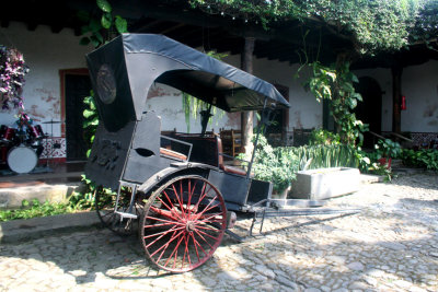  A wagon on display at La Posada de Ron Rodrigo Hotel.