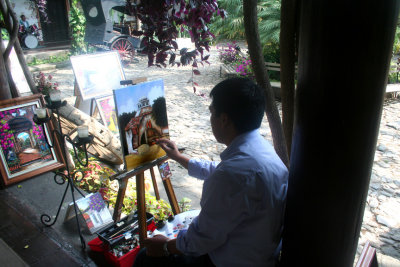 An artist at work at La Posada de Ron Rodrigo Hotel.