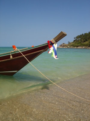 Bottle beach - longtail boat.JPG