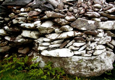 Wall of stone aged hut near Dingle