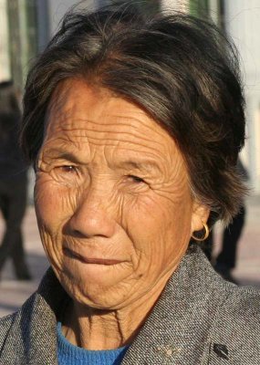 Caring Grandmother - Farmer's village