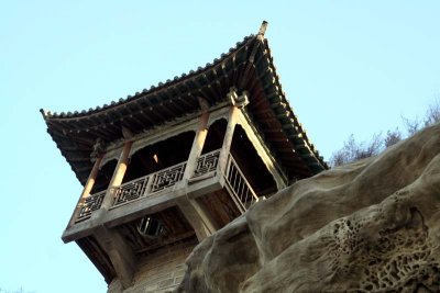 A small pagoda at edge of mountain.  The hole in the bottom matched one in the topl.