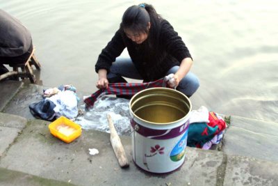 Washing clothes in the river