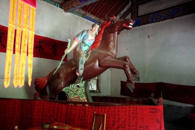 Xue Ping-Gui breaks a wild stallion