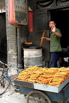 Camera shy street cook