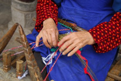 Huang Long Xi - outside Chengdu - Traditional straw shoe maker