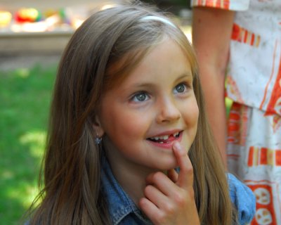 toothless 8yr old at Jana's BD party