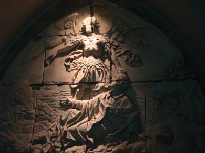 A sculpture of St. Michael in the crypt