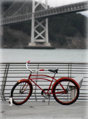 Bright red bike on a cold, gray day