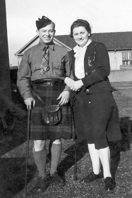 Bill in a kilt with Mrs Nisbet.jpg