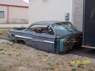 1961 Chevy Impala.......what's left of it.