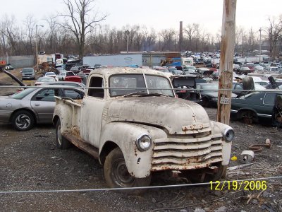 Chevy pickup in a junkyard in Wellston