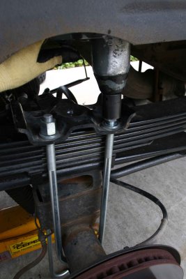 Remove U-bolts and Springs