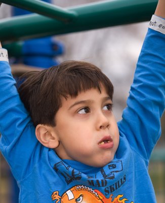 Ben, almost 5,  tackling the monkey bars