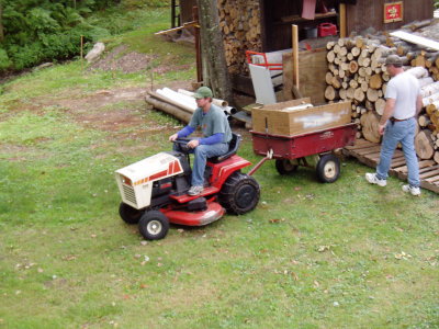 Yard work.  Me on tractor.  Steve too