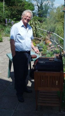 A very rare photo of Mick pretending to barbeque