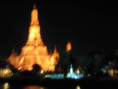 On a boat cruise along the Menon Chao Phraya at night