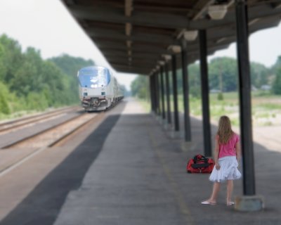 Girl waits for the Train