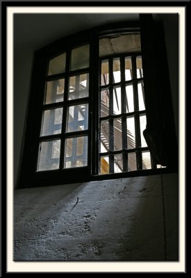 Prison Corridor Window, Barred and Spiked