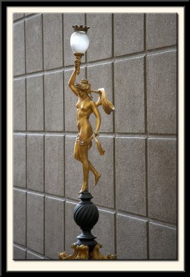 Figure with a Lamp