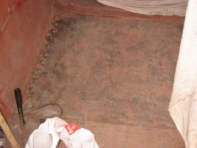 One of the floor sections having been angle ground