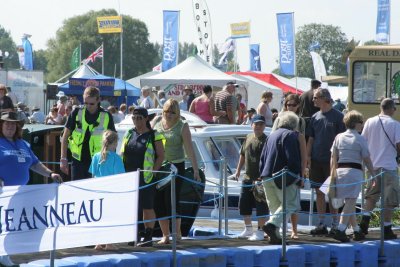 The public inspect the exhibition boats