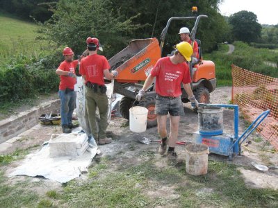 Fetching sand & mixing mortar