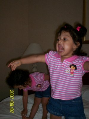 2 lil monkeys jumping on the bed