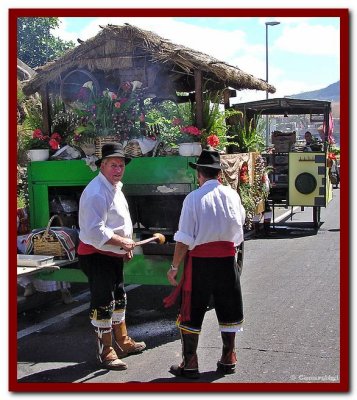 Cooking sausage before procession.jpg