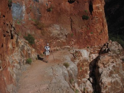 Small hiker in big rocks