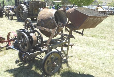 AN EARLY POWERED CONCRETE MIXER