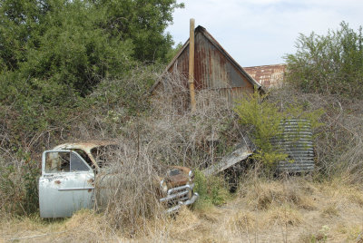 HOUSE AND CAR ABANDONED