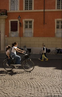 Mother-daughter cycling Parma Italy.jpg