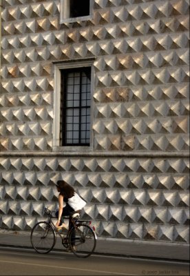 Ferrara-cyclist fixing shoe.jpg