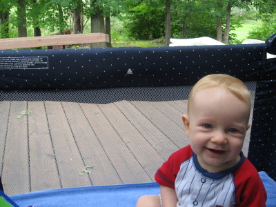 Enjoying the great outdoors on Grandma's back deck