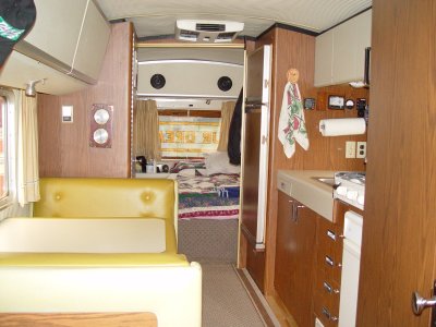 A TRASH COMPACTER HAS BEEN ADDED TO THE GALLEY AREA ALONG WITH THE WOOD FLOORS