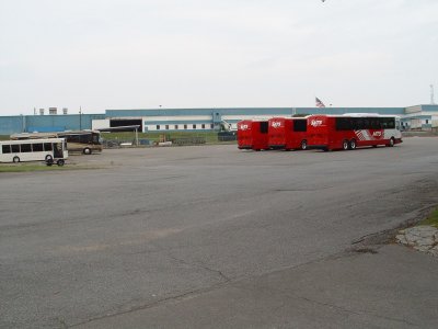 THREE NEW TRANSIT BUSES READY FOR DELIVERY, THEY WERE GONE WHEN I LEFT