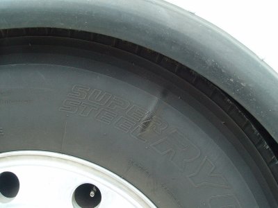 ON MY MORNING WALK AROUND, THE RIGHT FRONT TIRE HAD THIS VISIBLE SEPARATION