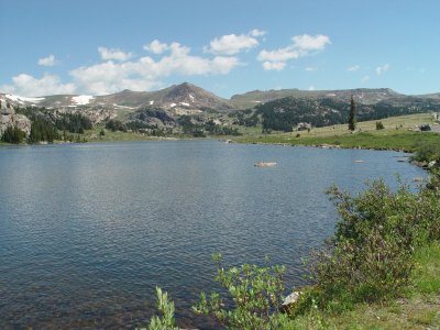 ON THE WAY OVER THIS LAKE REFLECTED THE MOUNTAINS IN THE BACKGROUND, BUT WE COULDN'T STOP THEN, SO I STOPPED ON THE WAY BACK