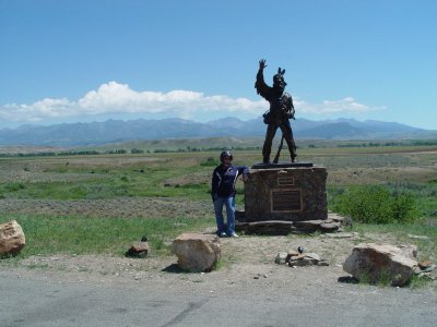 KAREN CHECKS OUT A MONUMENT TO ONE OF THE LOUIS AND CLARK EXPEDITION, AS WE RIDE AROUND THE CRAZY MOUNTAINS