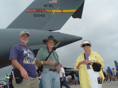 LARRY DILL, CLIFF VAUGHN AND BARBARA VAUGHN IN FRONT OF A C-17 TRANSPORT PLANE
