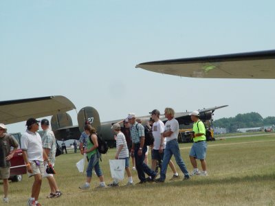 A B-24 LIBERATOR IN THE BACKGROUND