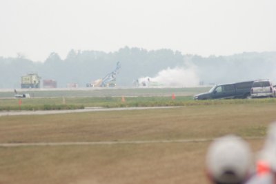 HERE ARE THE TWO P-51 MUSTANGS SHORTLY AFTER THEY COLLIDED, THE PILOT WAS KILLED IN THE ONE THAT IS TURNED OVER