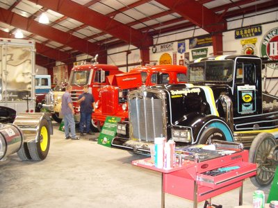 THAT'S DAVE ON THE LEFT , HE GAVE ME THE PERSONAL TOUR AND HE REALLY KNOWS HIS STUFF ABOUT OLD TRUCKS