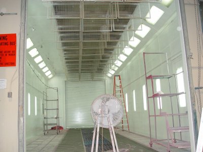 HERE IS ONE OF THE PAINT BOOTHS IN THE PROCESS OF BEING REFURBISHED