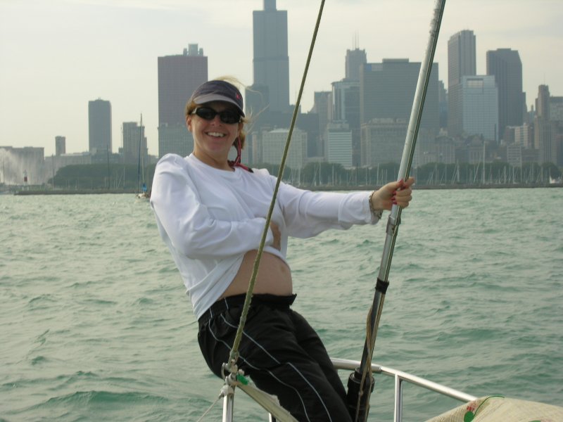 Magy sailing with baby on Lake Michigan along the Chicago coastline